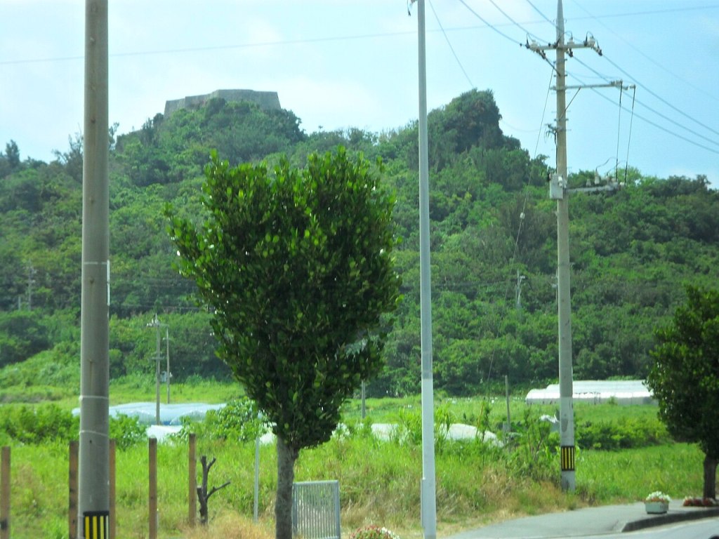 Katsuren Castle on its hill seen from the road below in Uruma, Okinawa