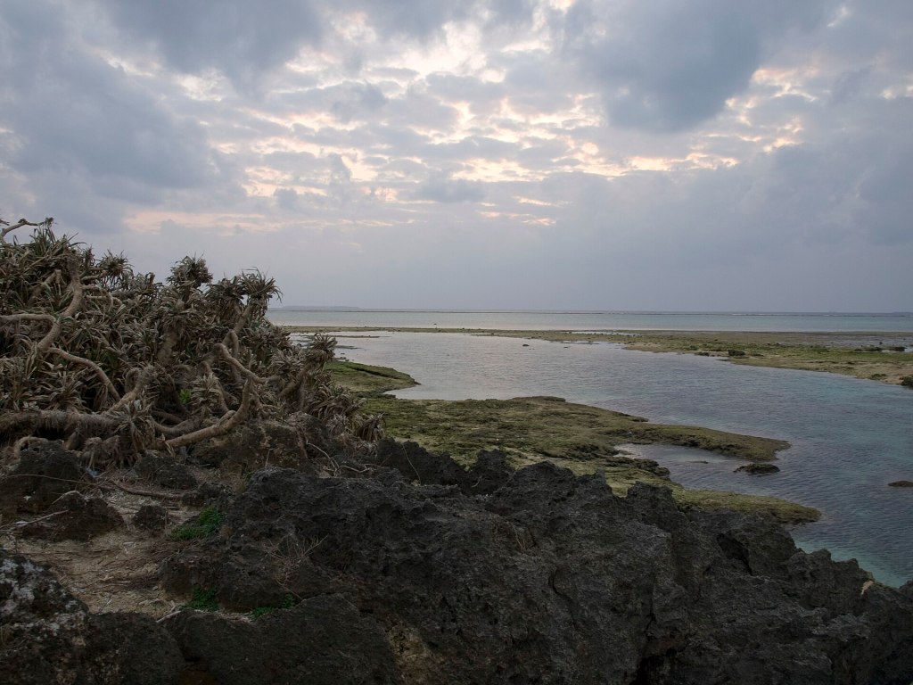 Evening light over Cape Bise and the sea toward Ie Island