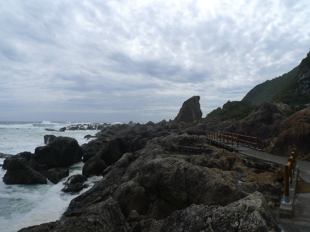 The Pacific coastline below Cape Muroto in Kochi, with marine terraces and dark blue water