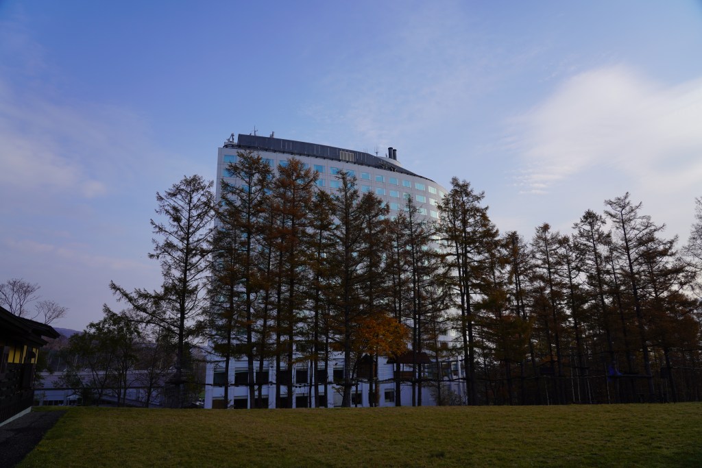 A resort hotel among larches in Niseko, Hokkaido, Japan