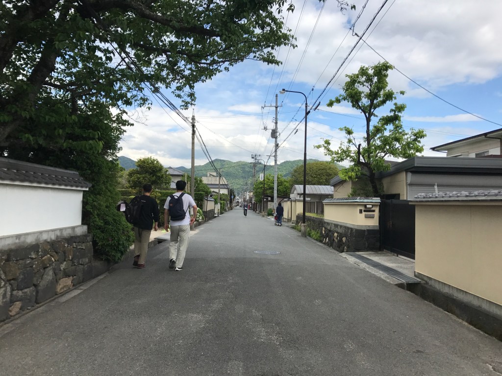 White plaster walls and a narrow lane on Gofukumachisuji street in the samurai district of Hagi, Yamaguchi, Japan