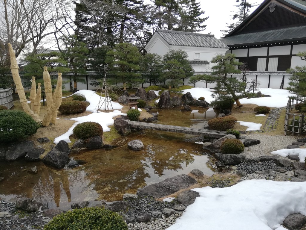 The garden by the reconstructed palace museum at Hikone Castle in Shiga, Japan
