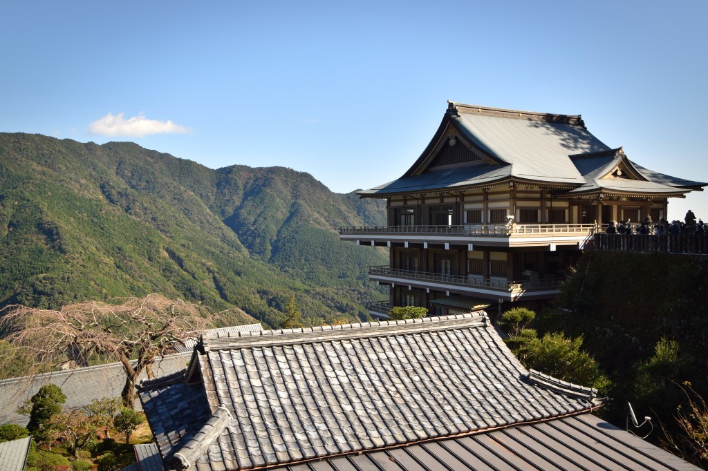 Wooden main hall of Kumano Nachi Taisha with a curved cedar-bark roof