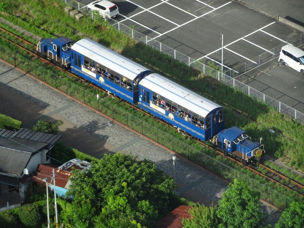 Shiokaze retro tourist train running along the Mojiko waterfront