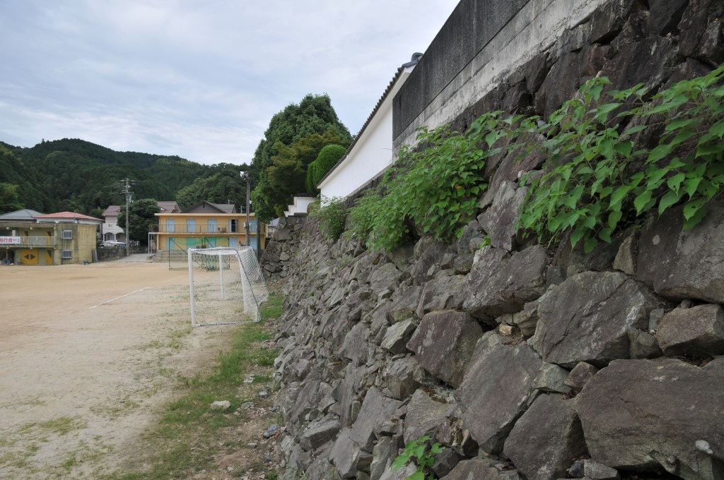 A turret at Ozu Castle above the river town