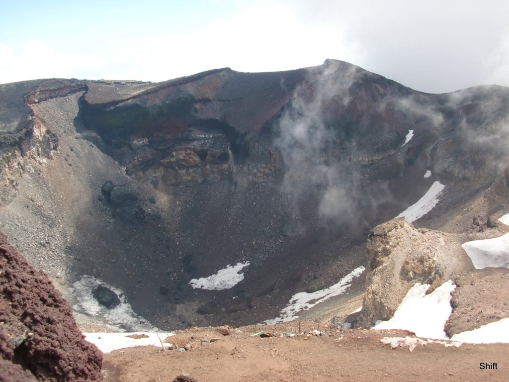 The summit crater of Mount Fuji seen from the crater rim