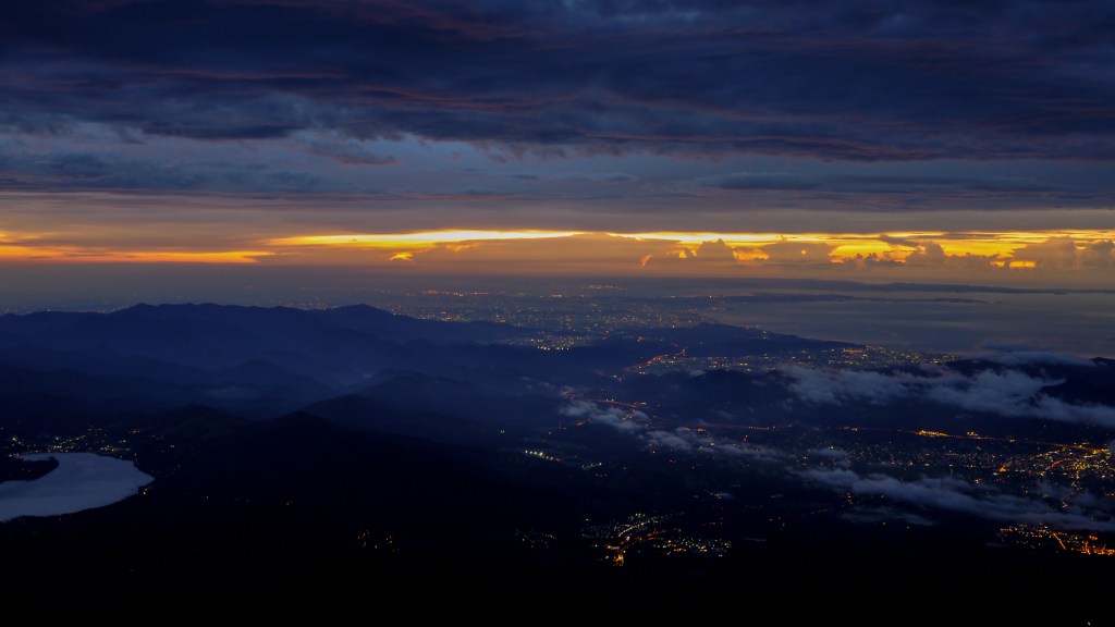 Sunrise over a sea of clouds seen from the summit of Mount Fuji