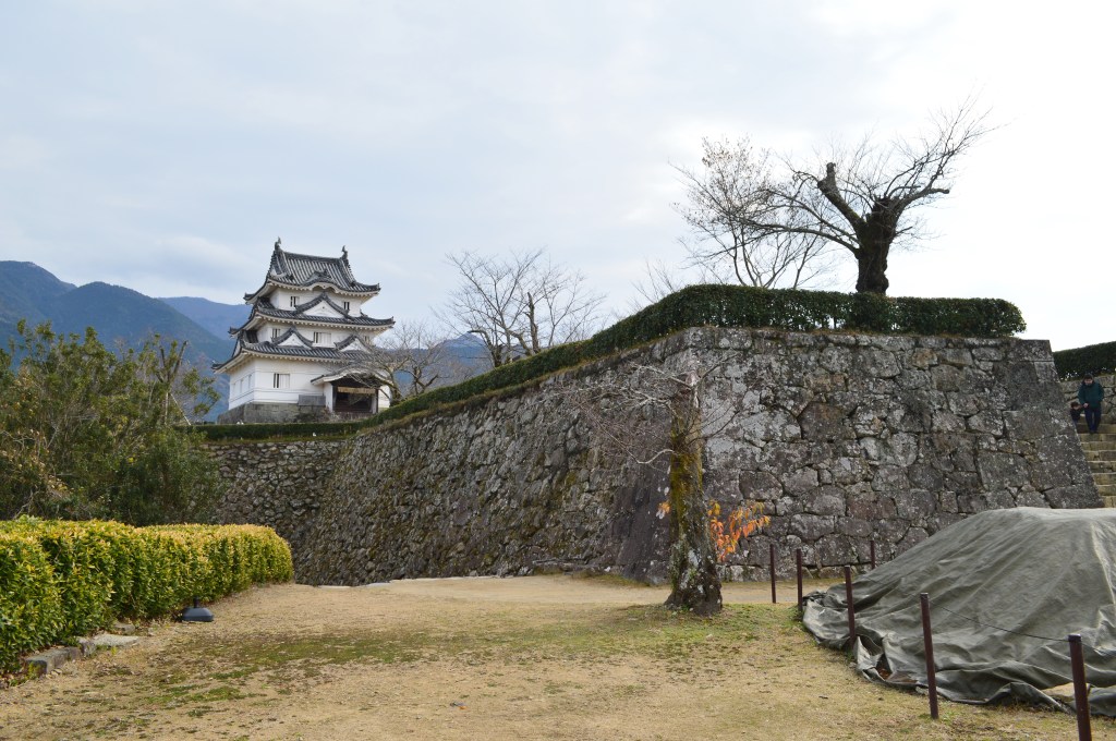 Another view of Uwajima Castle above the port